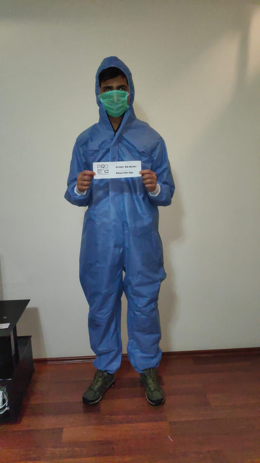 Disposable coverall sticky 